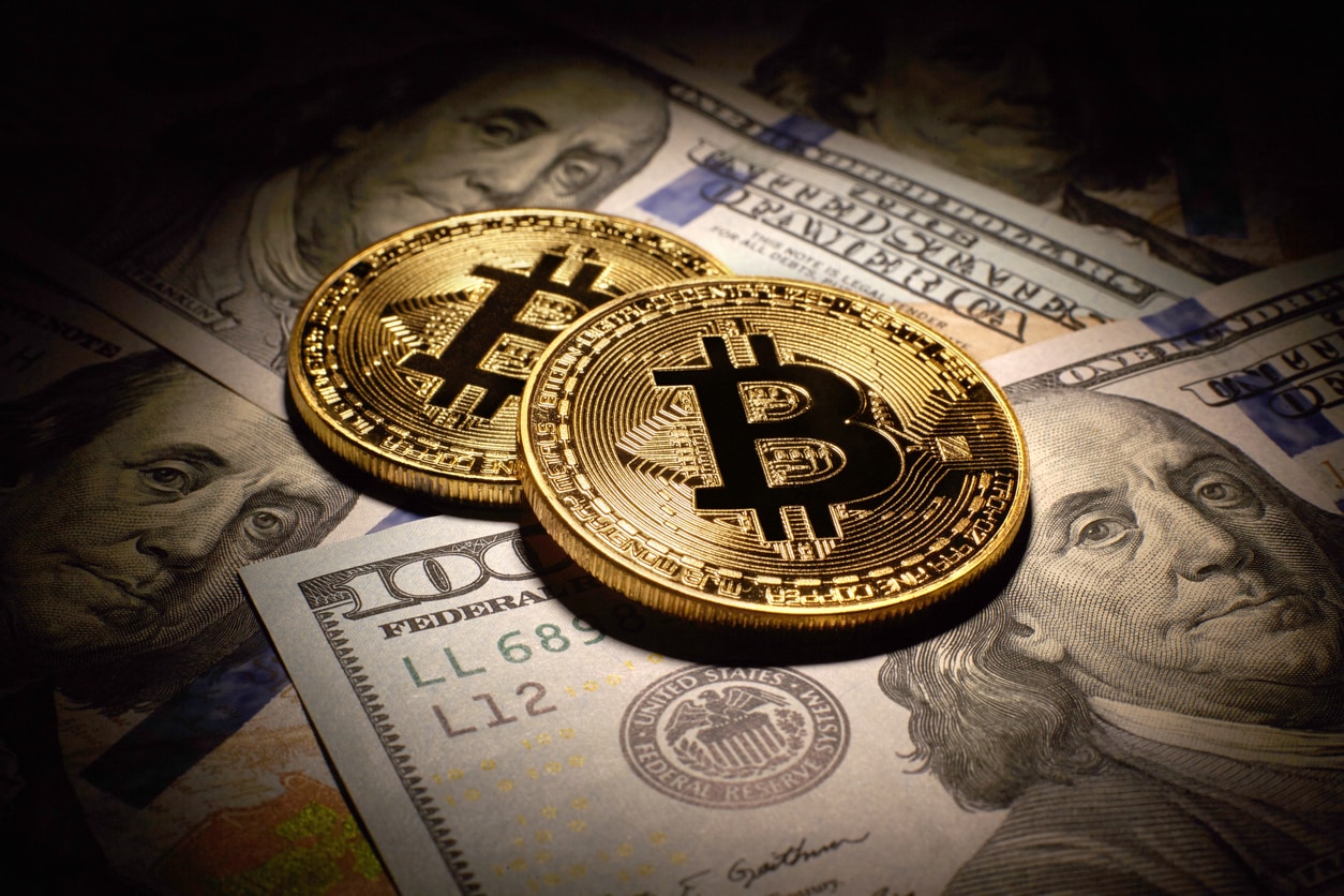 Golden Bitcoins Coins and dollar bills